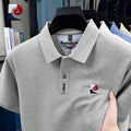 Sports Shirt New summer mens high-quality casual short sleeved polo shirt trendy and fashionable sweat absorbing